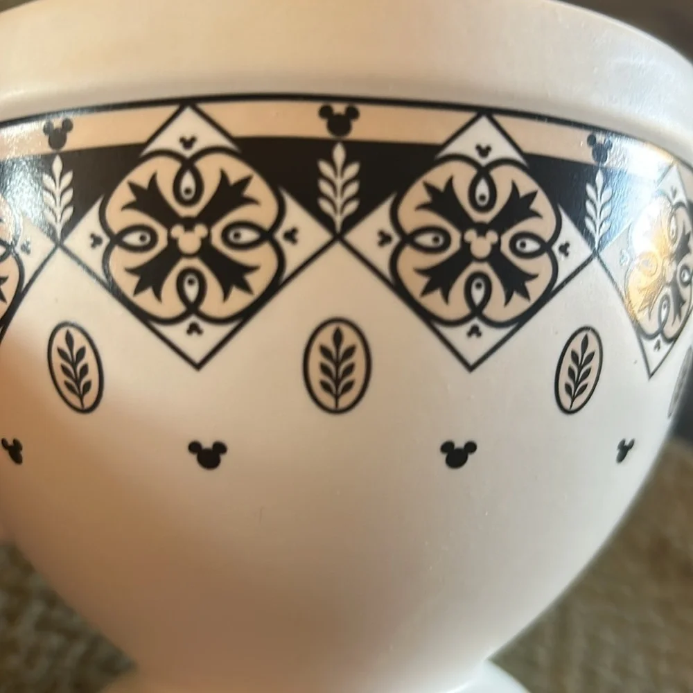 Disney cup or small soup bowl. White with black designs.